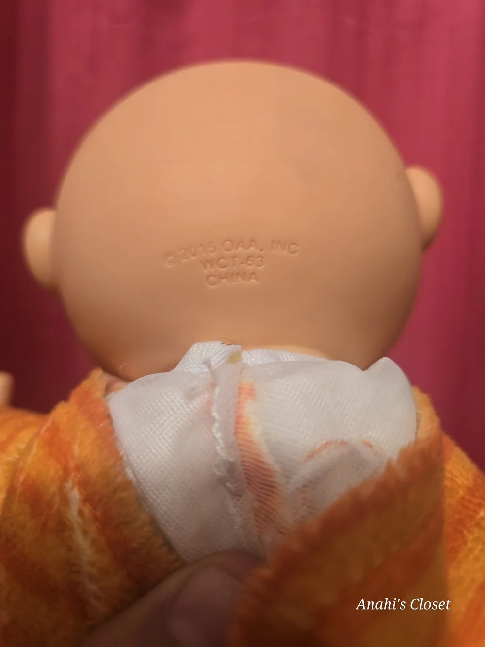 Orange Cat Plush Baby Doll with Yellow Belly and Blue Bow